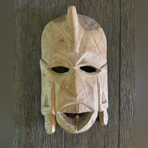 Carved wood tribal mask